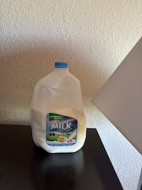 Milk was at room temperature, not sure how long it had been setting out.