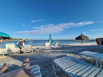 On the private beach.