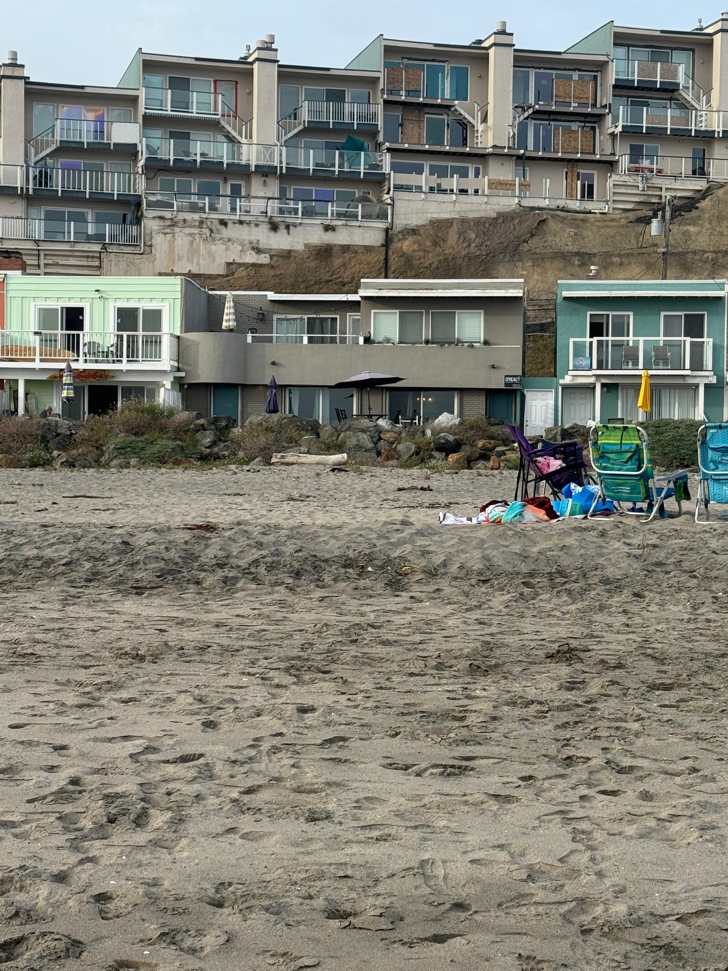 View of home from the edge of water. 