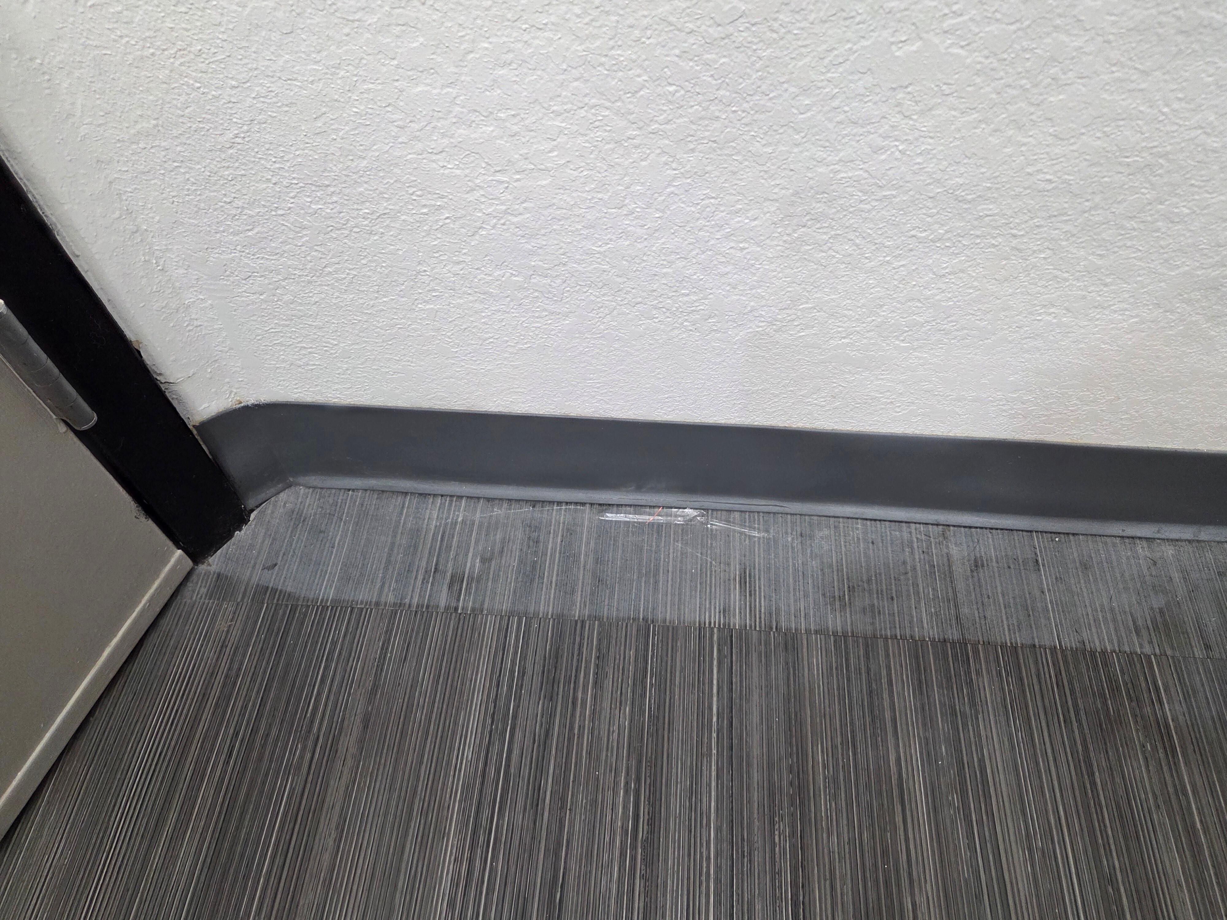 Garbage behind the bathroom door