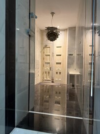 The inside of the entrance to the building. Clean and shiny.