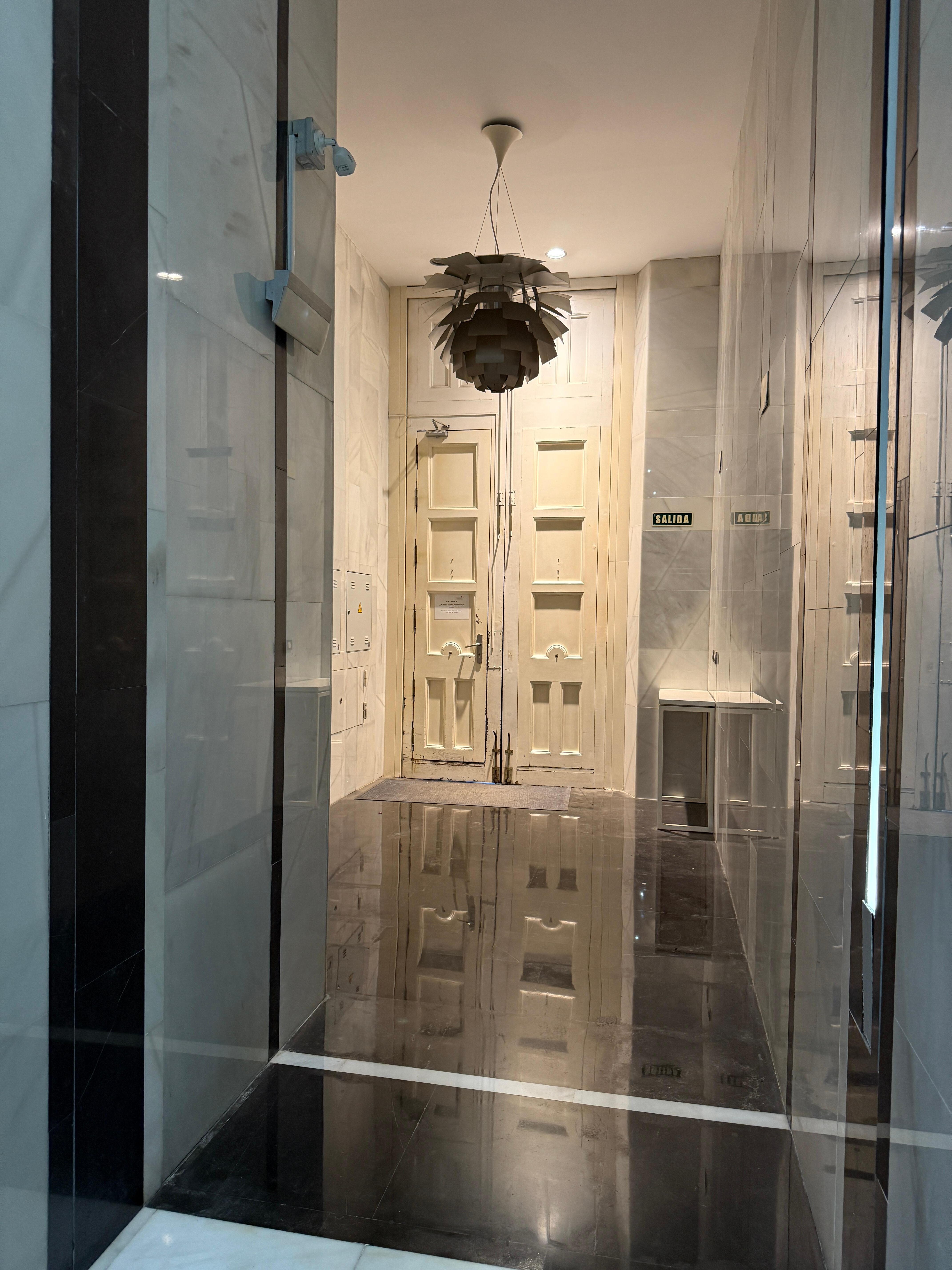 The inside of the entrance to the building. Clean and shiny.