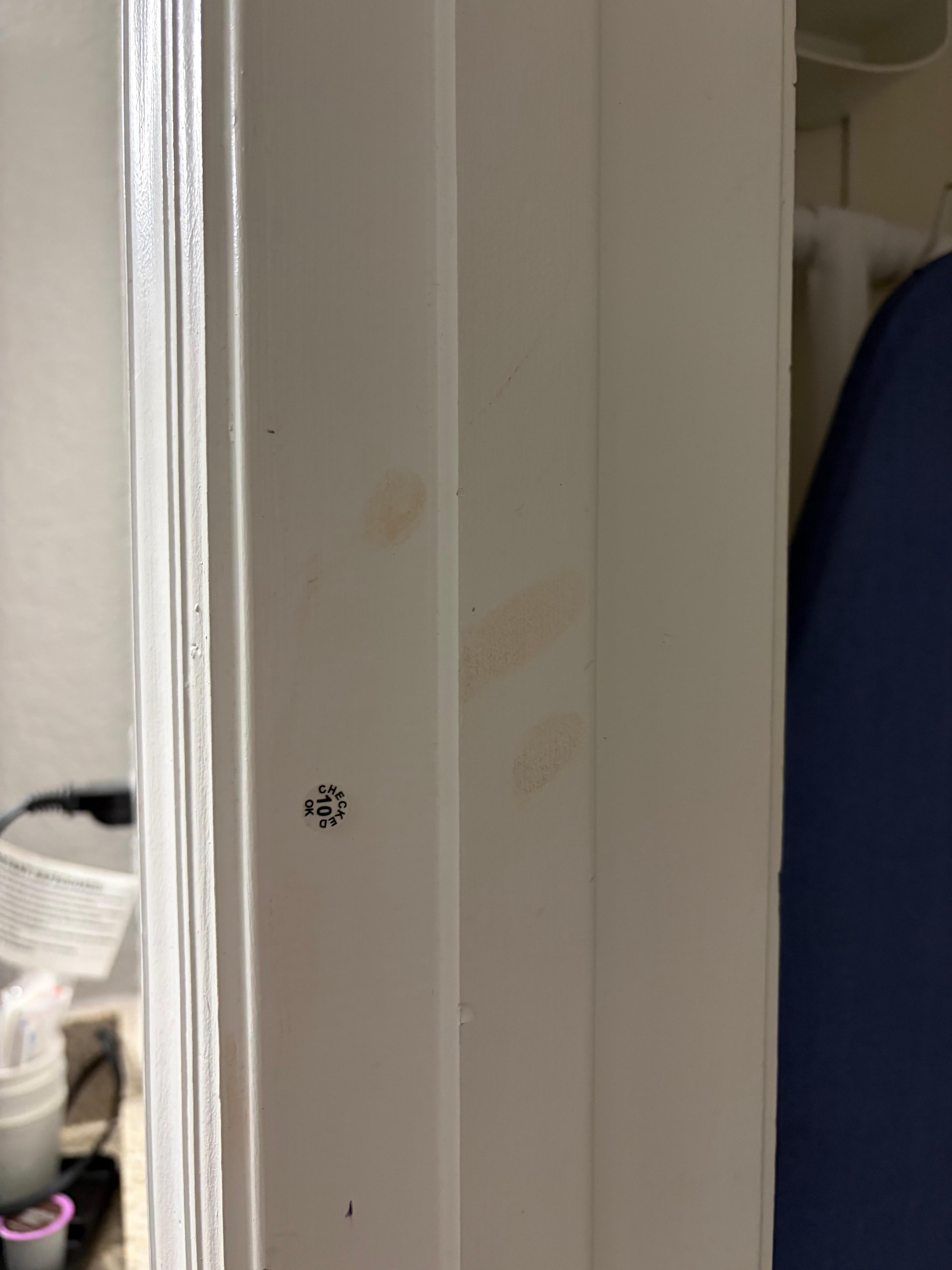 Dirty hand print on door frame to “closet”