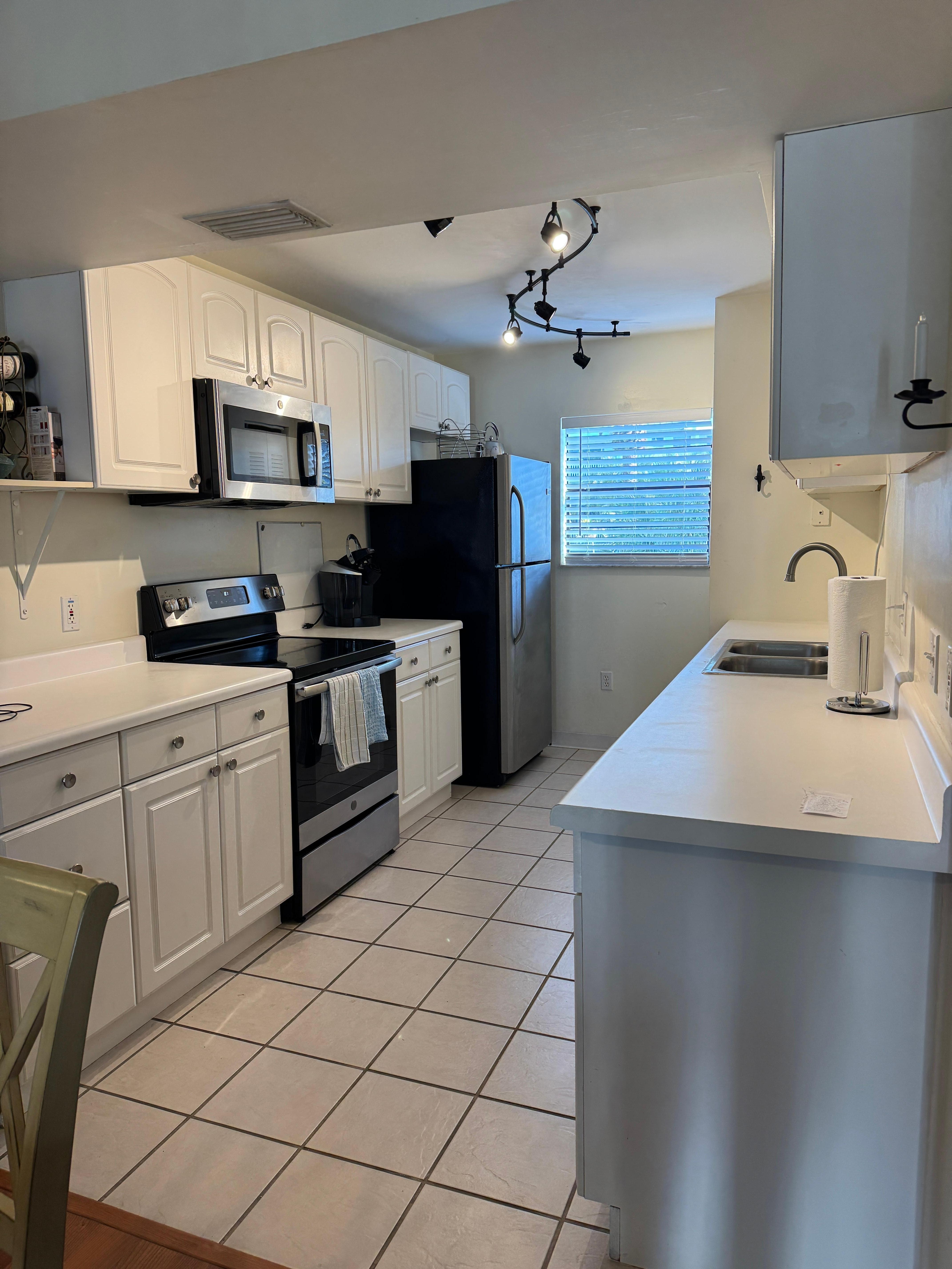 I really enjoyed the kitchen. Just a sampling of how neat and tidy this condo is. 