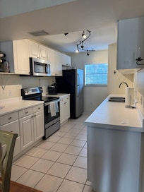 I really enjoyed the kitchen. Just a sampling of how neat and tidy this condo is.