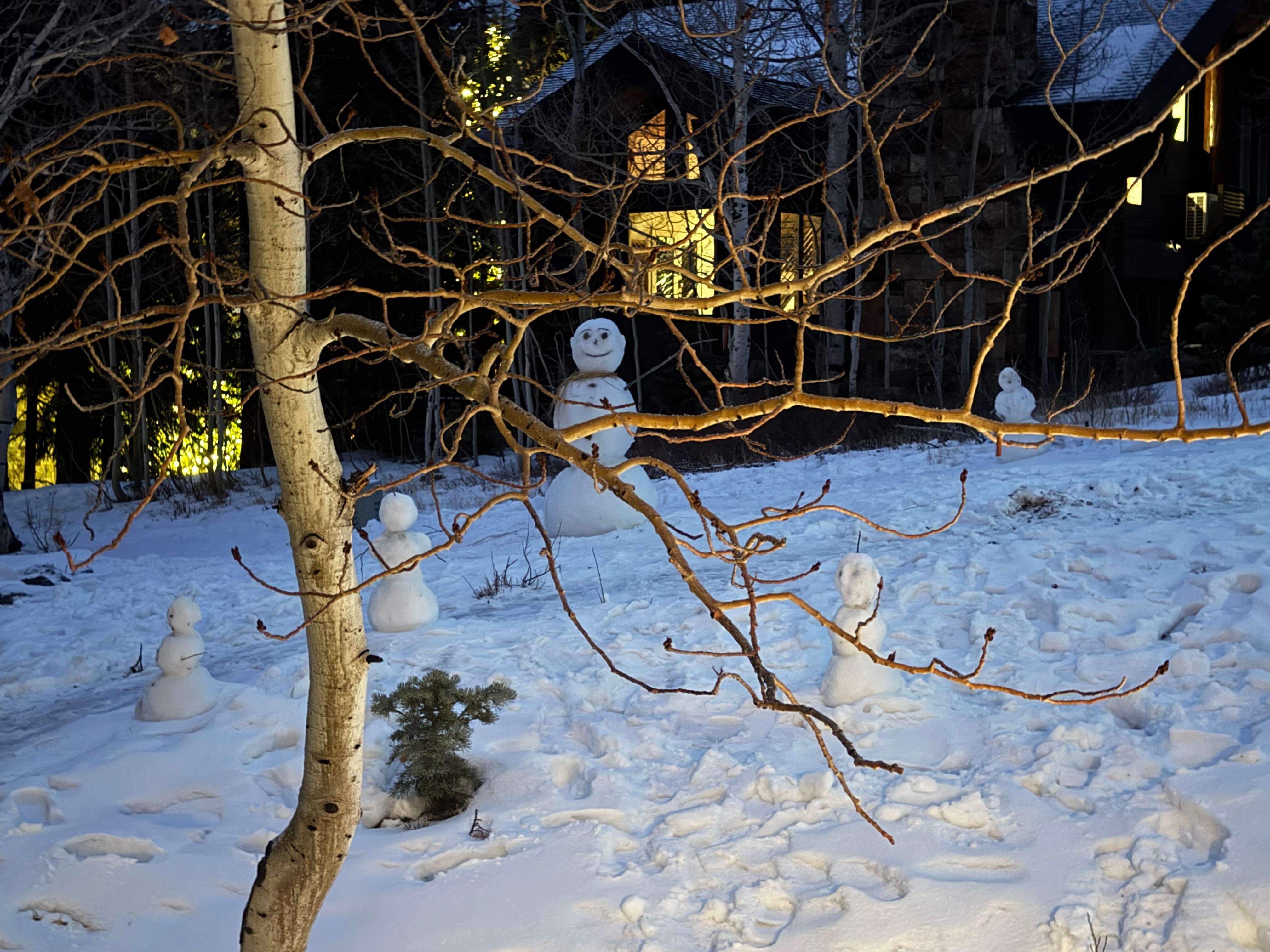 Building snowman outside the front door