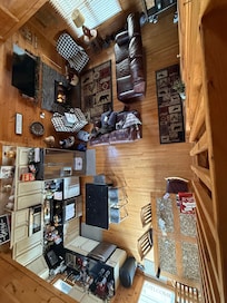 The loft overlooks the well appointed kitchen and living room.