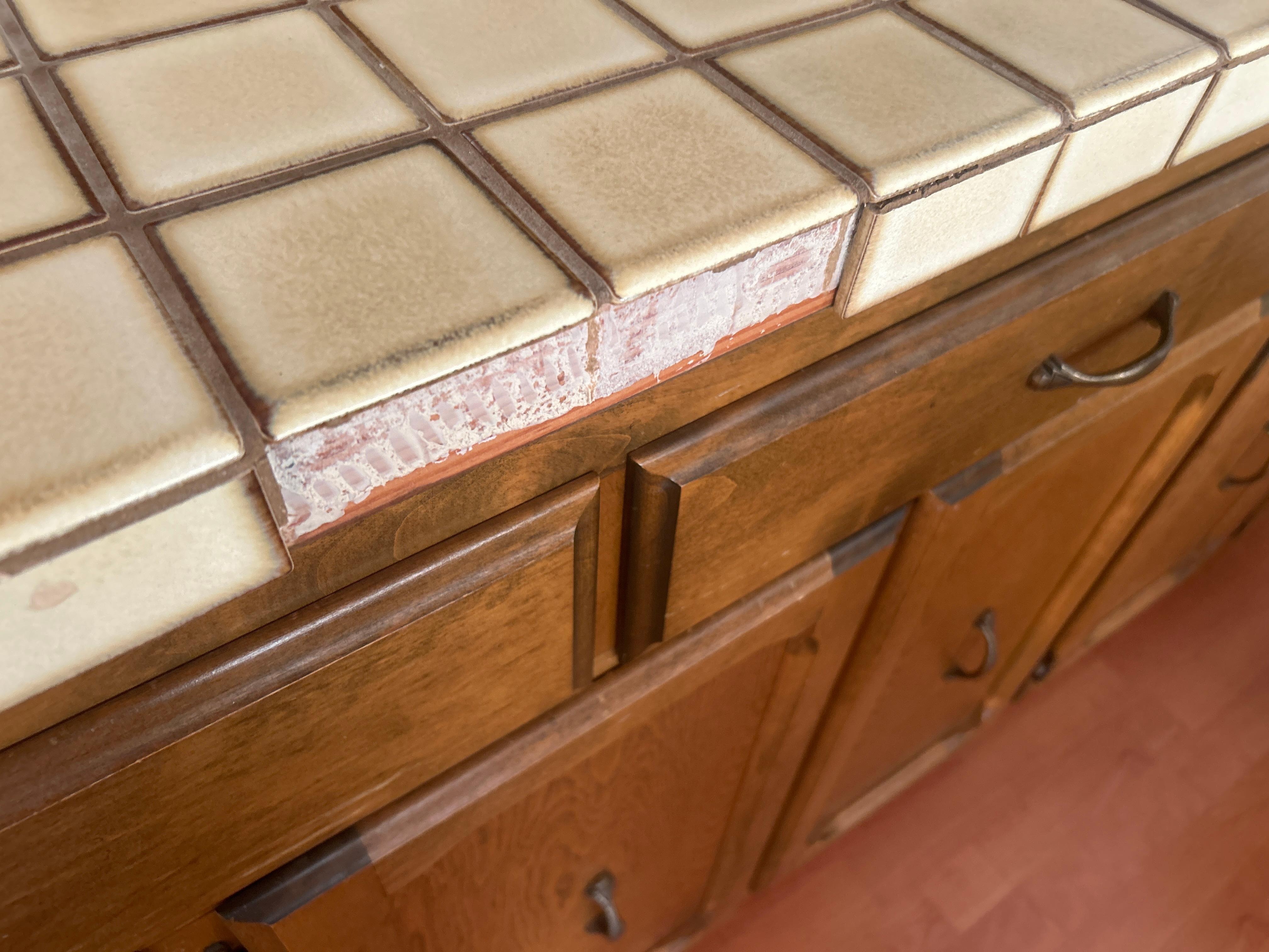 Broken tile in dining area 
