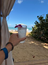 Cabana with 4 beach chairs/umbrella and dedicated server.