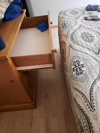 Only 1 person could get passed the end of bed at a time. No place to hang clothes, only 1 chair in the room. Bed was not a true queen size it was equal to a double sized bed