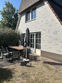 Garden area and table set.