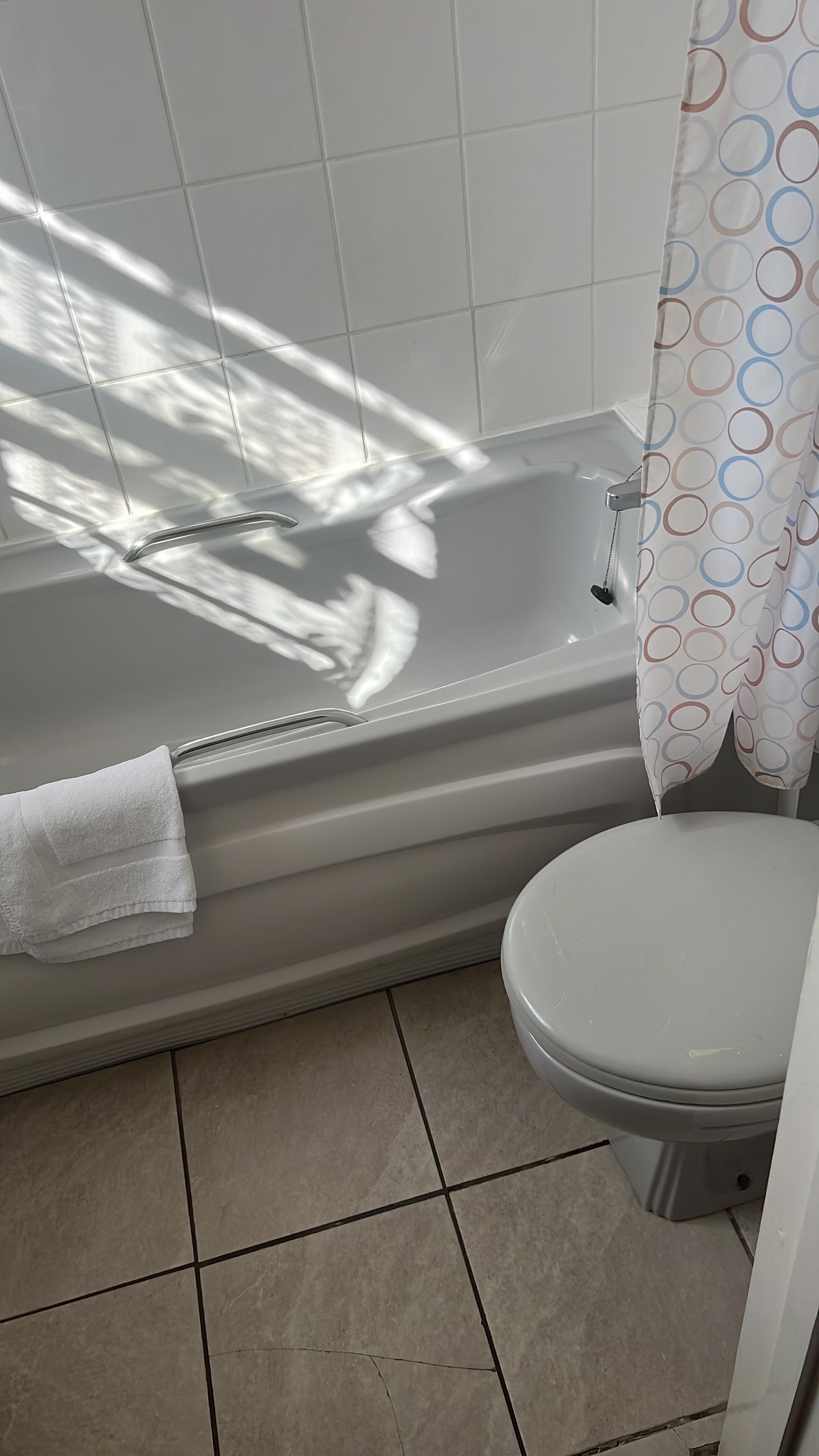Bathroom - a little problem the shower curtain hits the light fitting so you have to push the plastic ringlets past the light fitting if you want to close it trouble if your not very talll