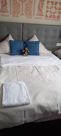 Left a cuddly toy on my bed when I was in a rush to get out.
Came back to it looking like it owned the place!