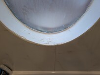 Paint peeling in the hallway bathroom shower