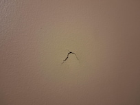 this is just another example of what I had to contend with. the door to the closet. damaged. needing repair. as did the standing water in the tub. .one notable person us named Peter. who did take time to help with my booking..he was exceptional.