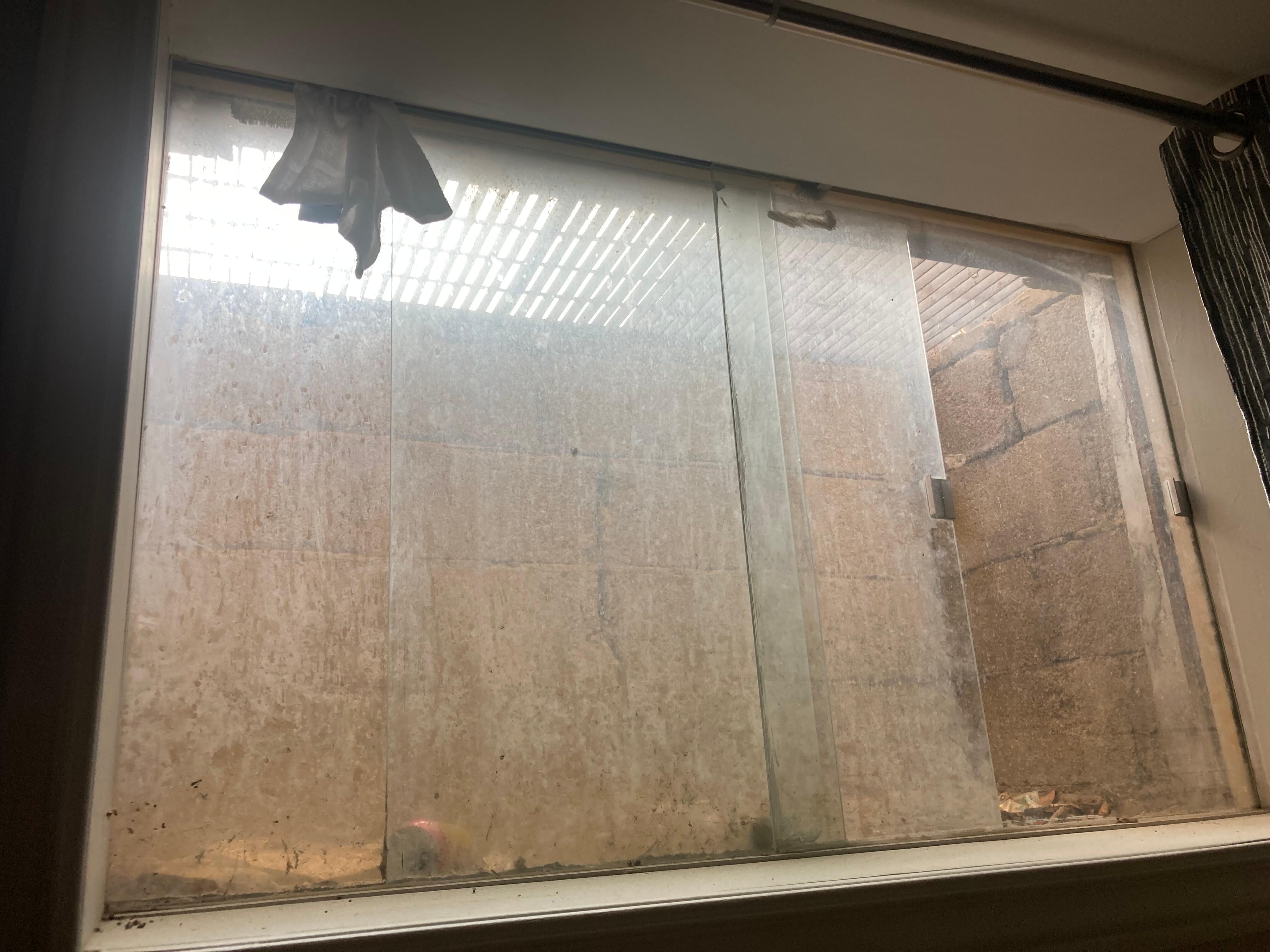 Disgusting window.  Assume rag is to block hole