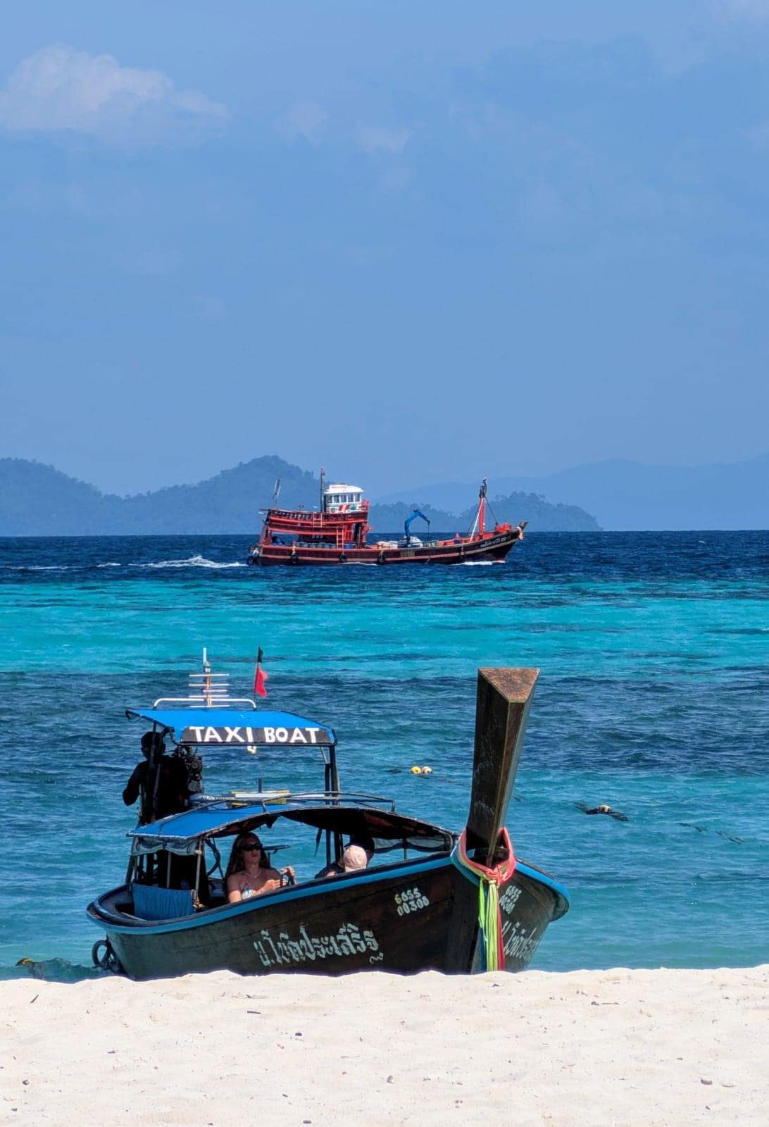Beautiful sea & not too many Longtail boats.