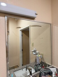 Unclean mirror and broken light.