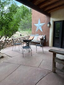 Back patio area accessible thru living area and two bedrooms.