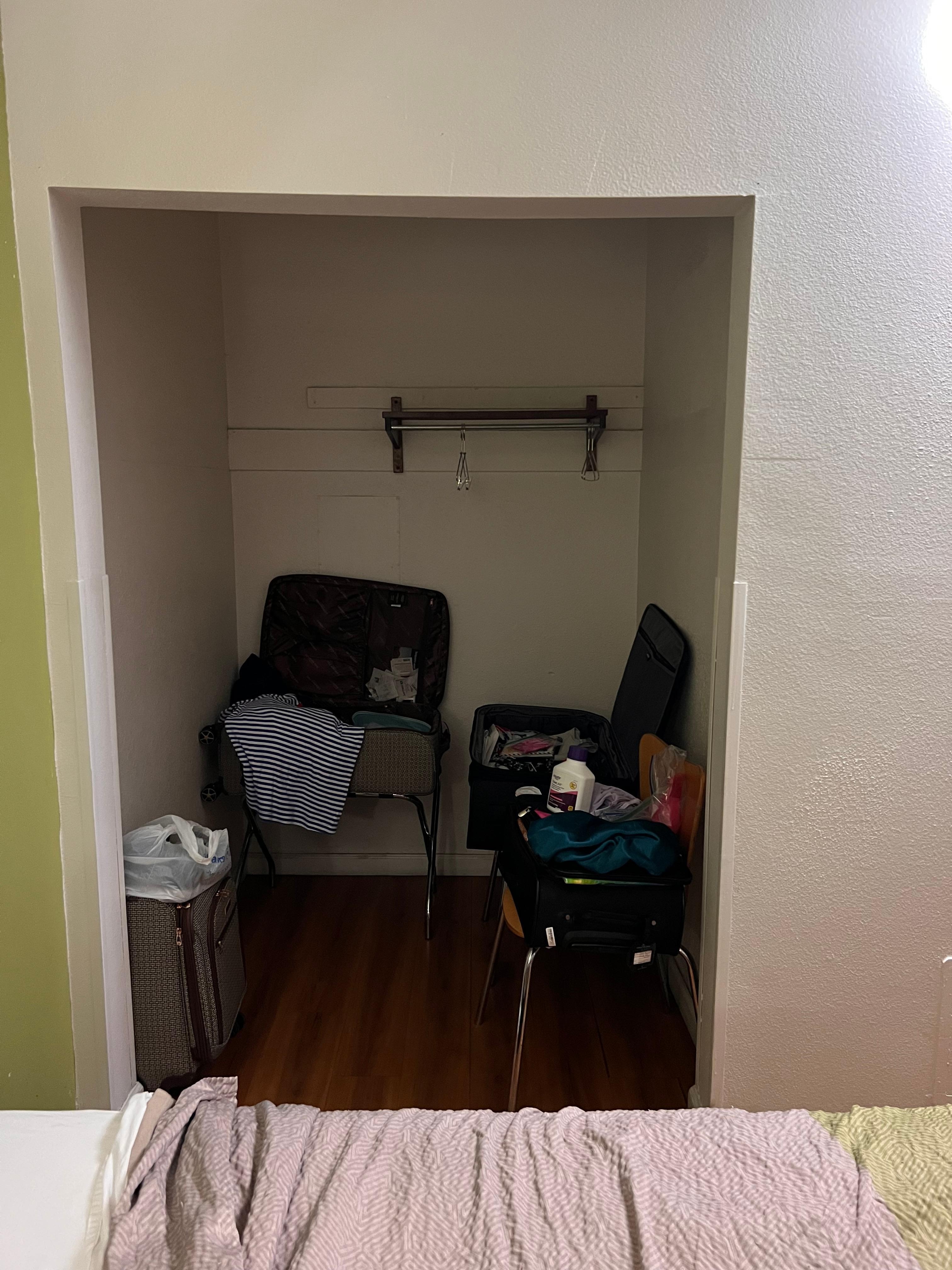 Closet with no lighting in an already dark room 