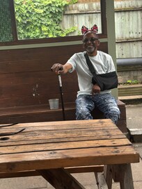 My uncle wearing the head dress that was for the Carnival