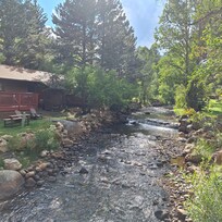 Fall River behind the cabins.