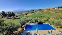 View from top floor of Villa with pool towards mountains