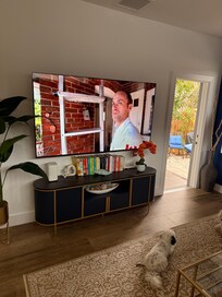 Living room walks out to backyard.