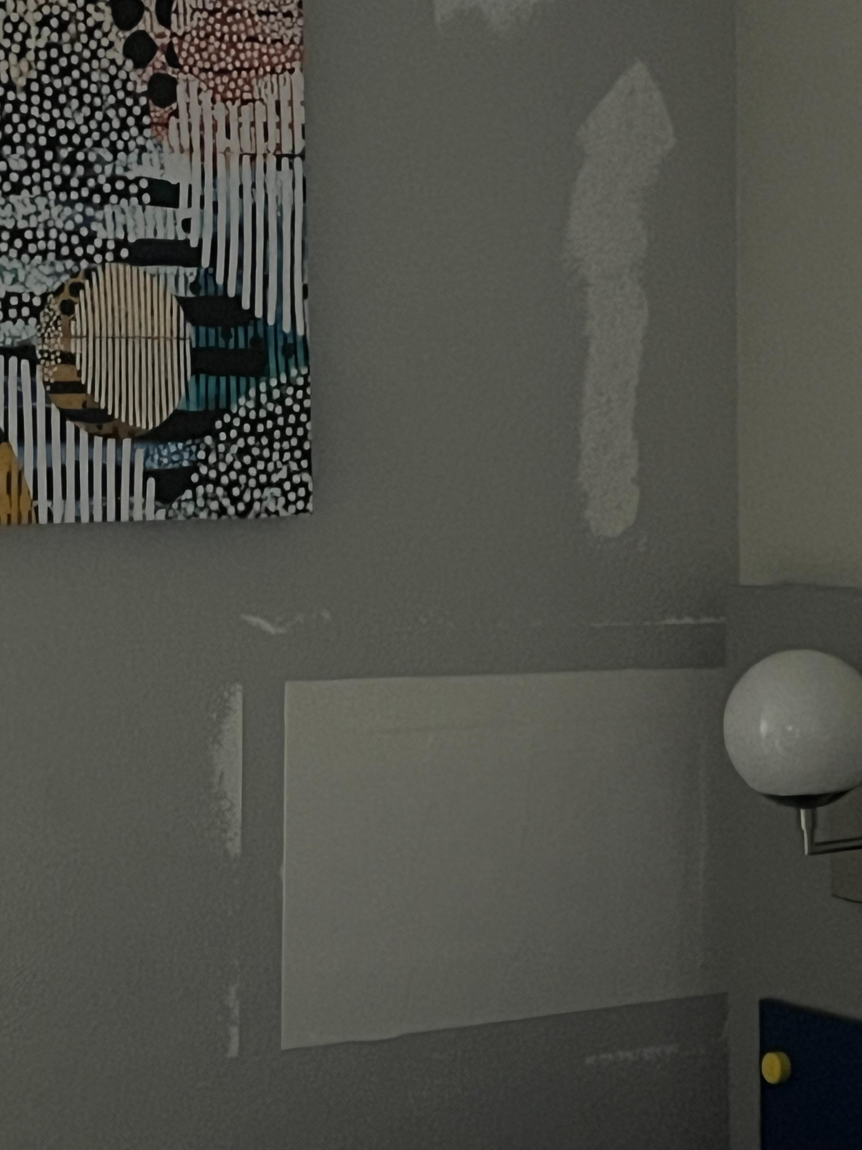 The wall by the bed that needed painting! 