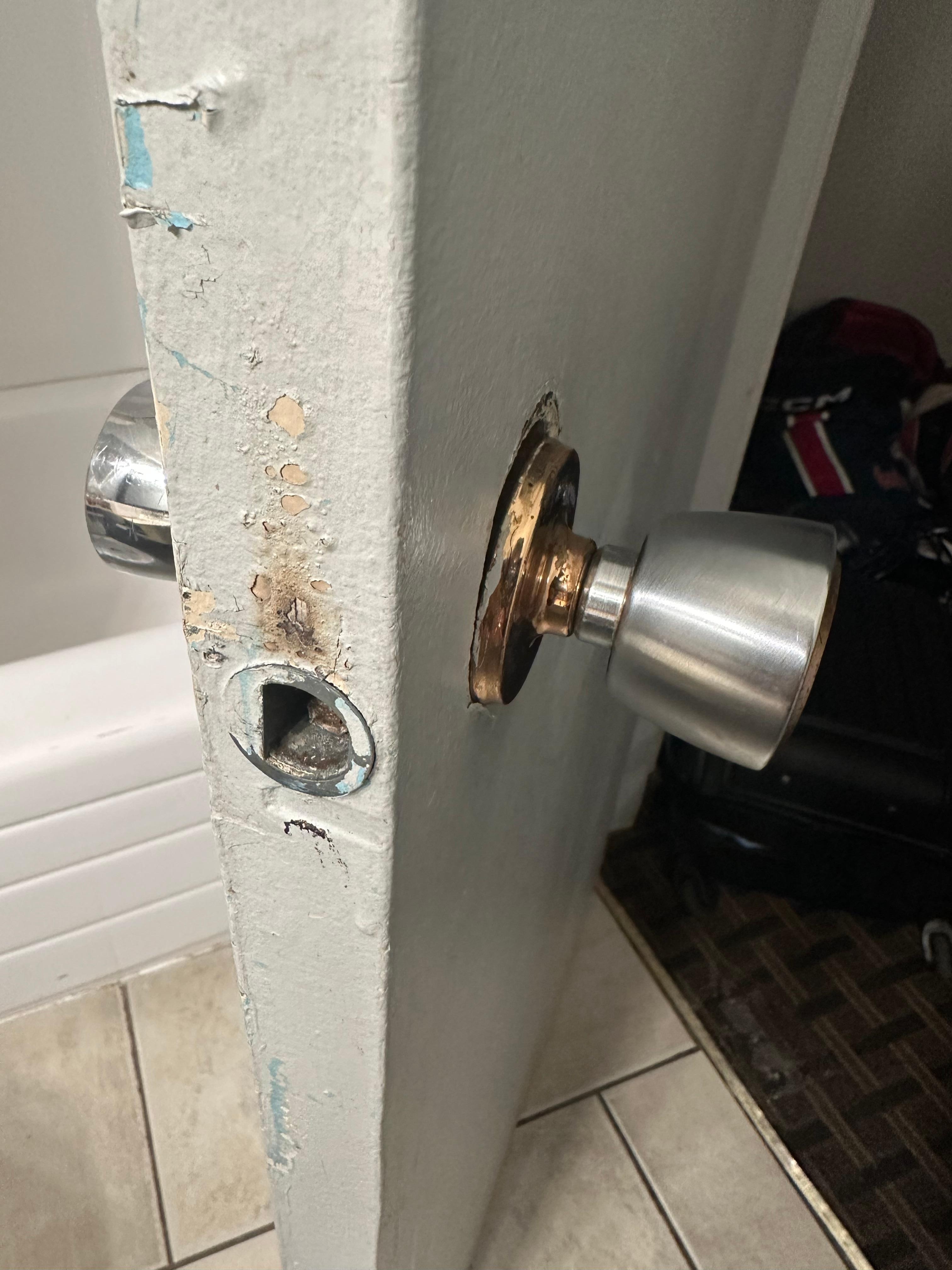 Broken door latch on bathroom door