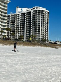 View of building from beach. Condo unit is on 2nd floor.