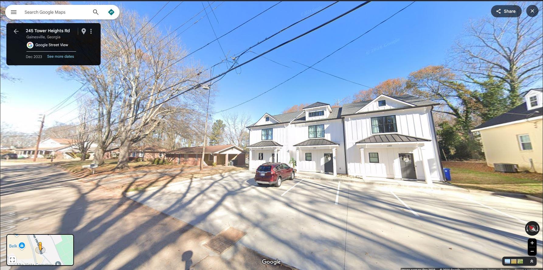 Picture of the homes on the street to the left of townhouse #1. (Townhouse #2 is in the middle.)