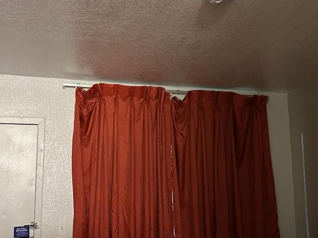 Drapes neither block light out nor seal view from outside. note overhead light not working