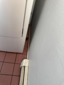 Lint on the side that you can view while using the toilet