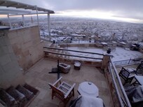 The terrace - the neighbouring restaurant is jusst the oother side of trhe fence