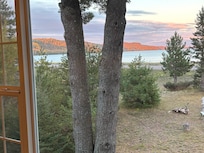 This is the view from the lounger on the front deck, looking all over the yard and lake❤️