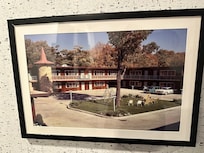 Portraits of original hotel in corridors.