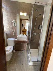 Clean well appointed bathroom that was maybe a little small for the the average tourist (I had to take my shoes off to use the toilet and I have relatively small feet).