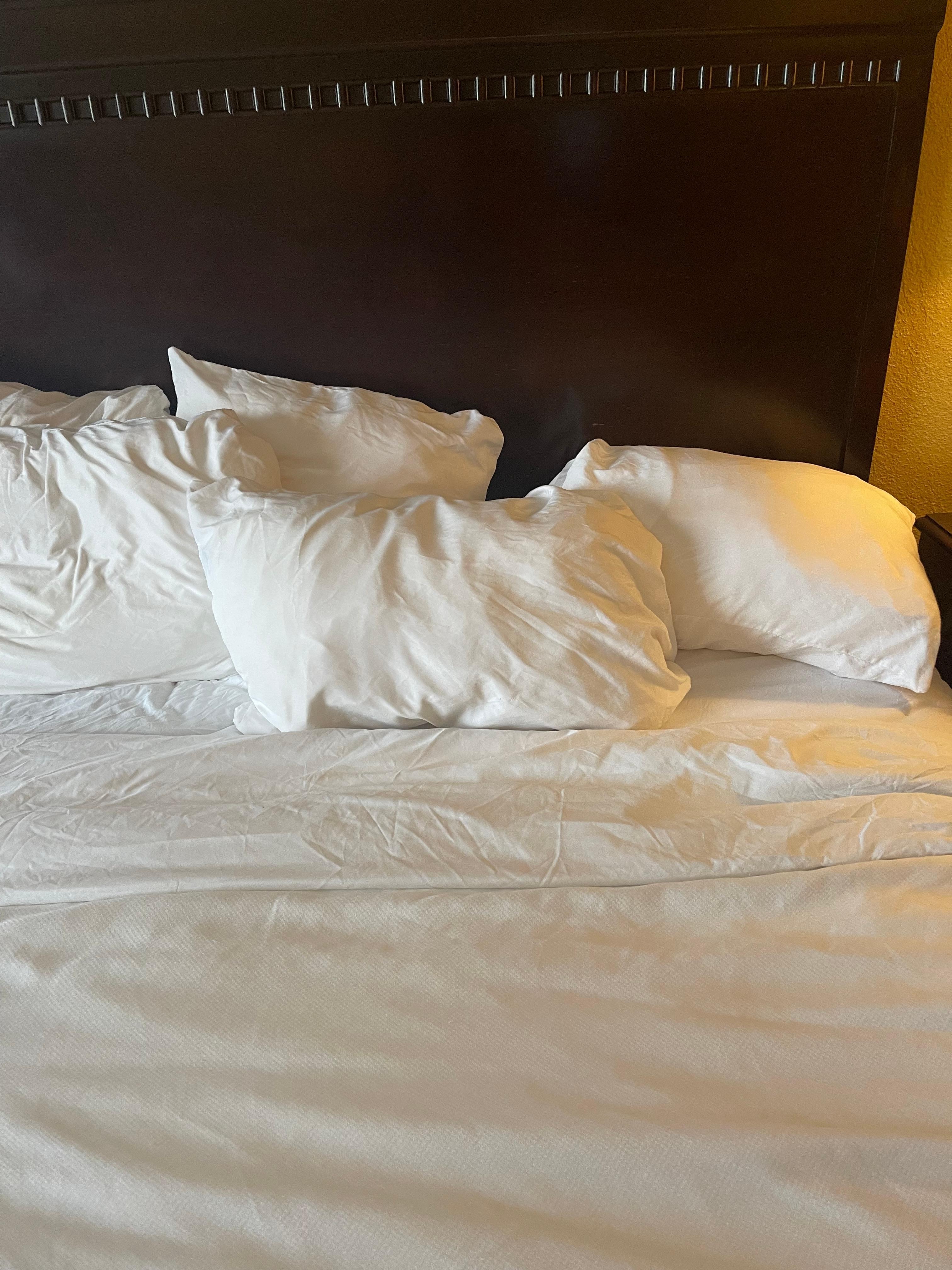 Bed looked in kept and slept in. 