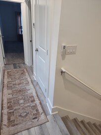 2nd floor main bedroom entrance and steps to 1st floor