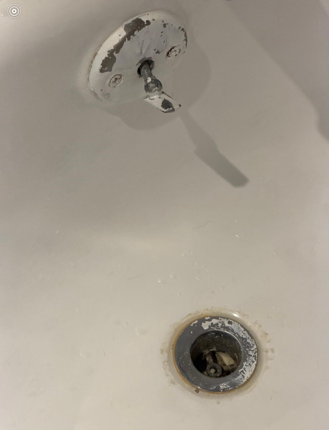 Bathtub rusted, corroded and outdated!