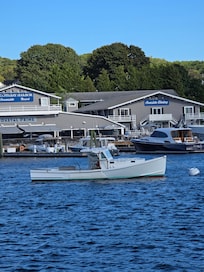 View of front of the hotel taken from across the harbor in the town of Bootbay Harbor