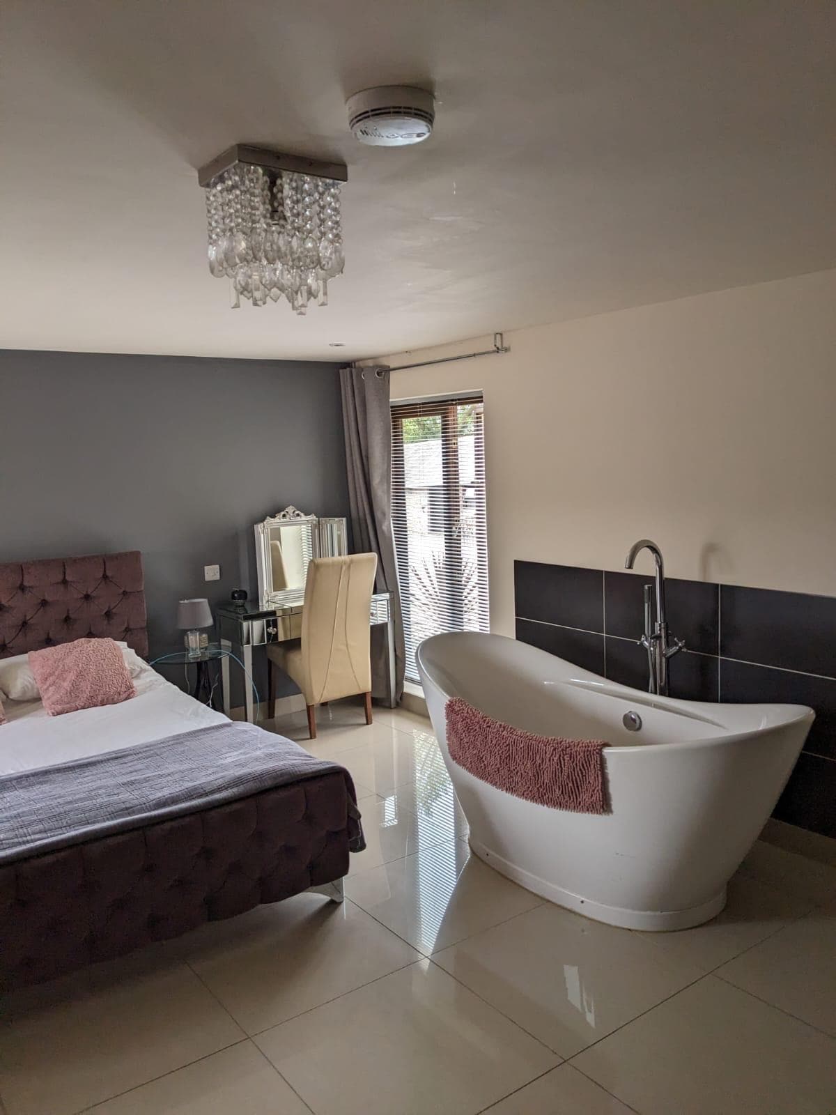 Bedroom and huge bath. Toilet , basin and shower off of bedroom 