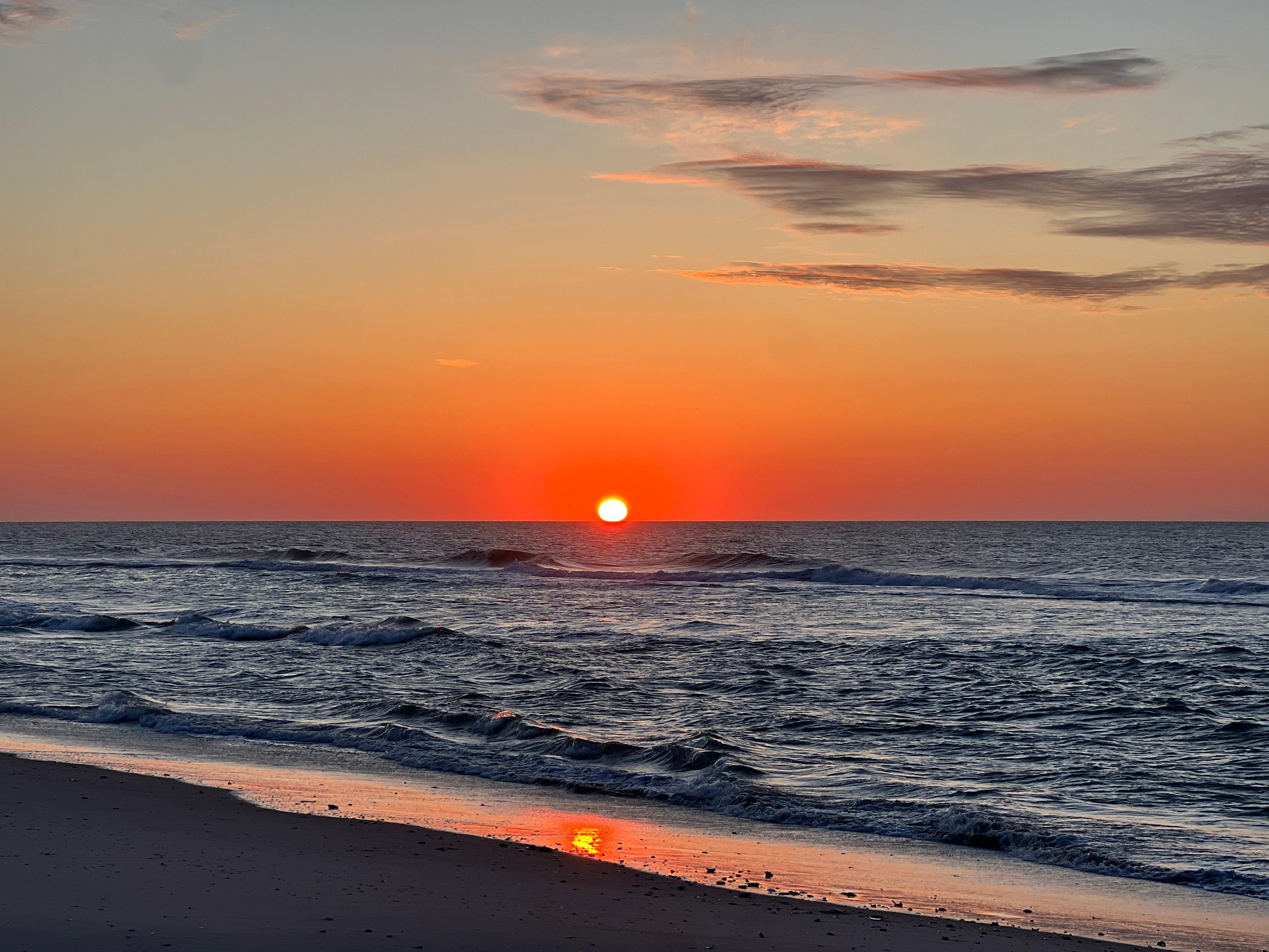 Sunrise. Minute of a walk up the ramp to the beach. 