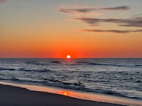 Sunrise. Minute of a walk up the ramp to the beach.