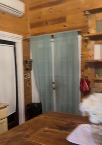 One of the two interior doors leading to other spaces.