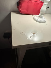 Night table that has water stains