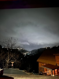 View from the hot tub on a rainy/foggy night.