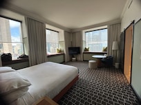 Bedroom, corner room with river views from all windows.