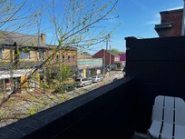 View from balcony towards parking lot